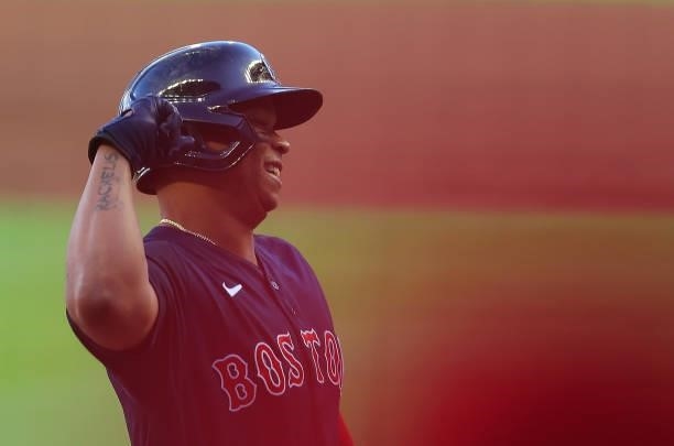 Rafael Devers of the Boston Red Sox reacts after hitting a three-run homer in the first inning against the Atlanta Braves at Truist Park on June 15,...