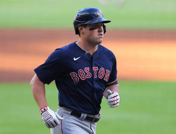 Hunter Renfroe of the Boston Red Sox rounds third base after hitting a solo homer in the first inning against the Atlanta Braves at Truist Park on...