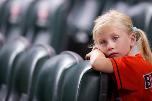 Fan looks on prior to a game between the Houston Astros and the Texas Rangers at Minute Maid Park on June 15, 2021 in Houston, Texas.