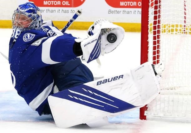 Andrei Vasilevskiy of the Tampa Bay Lightning makes a glove save against the New York Islanders during the first period in Game Two of the Stanley...
