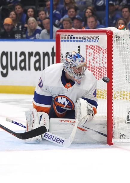 Semyon Varlamov of the New York Islanders watches the puck as he tends goal against the Tampa Bay Lightning during the first period in Game Two of...