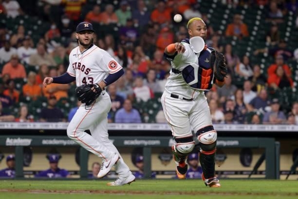 Martin Maldonado of the Houston Astros throws out Jason Martin of the Texas Rangers during the fourth inning at Minute Maid Park on June 15, 2021 in...