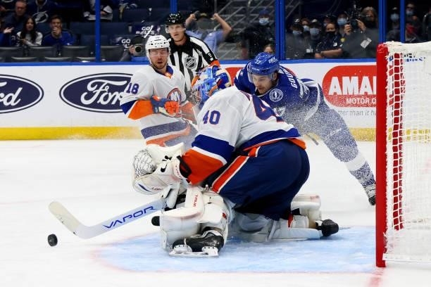 Semyon Varlamov of the New York Islanders tends goal against Yanni Gourde of the Tampa Bay Lightning during the second period in Game Two of the...