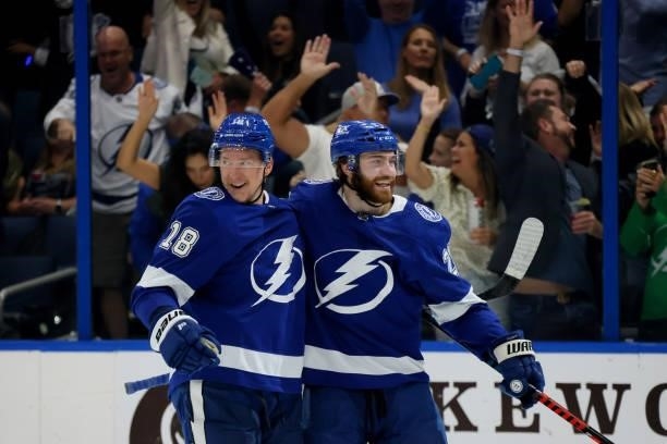 Ondrej Palat of the Tampa Bay Lightning celebrates with Brayden Point after scoring a goal on Semyon Varlamov of the New York Islanders during the...