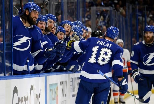 Ondrej Palat of the Tampa Bay Lightning celebrates with his teammates after scoring a goal on Semyon Varlamov of the New York Islanders during the...