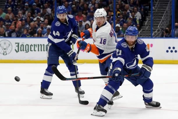 Brayden Point of the Tampa Bay Lightning looks for the puck against Anthony Beauvillier of the New York Islanders during the second period in Game...
