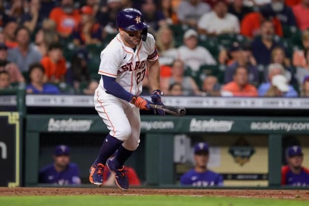 Jose Altuve of the Houston Astros singles during the sixth inning against the Texas Rangers at Minute Maid Park on June 15, 2021 in Houston, Texas.