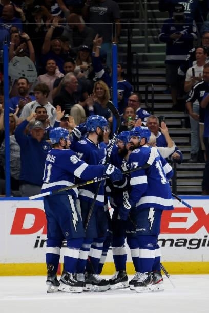 Victor Hedman of the Tampa Bay Lightning celebrates with his teammates after scoring a goal on Semyon Varlamov of the New York Islanders during the...