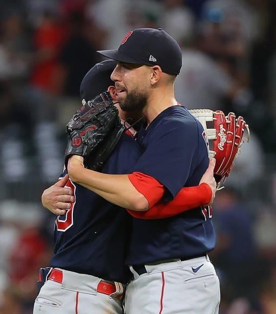 Alex Verdugo and Matt Barnes of the Boston Red Sox hug as they celebrate their 10-7 win over the Atlanta Braves at Truist Park on June 15, 2021 in...