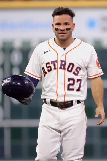 Jose Altuve of the Houston Astros looks on after being out during the third inning against the Texas Rangers at Minute Maid Park on June 15, 2021 in...