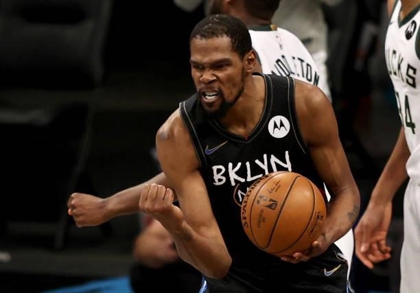 Kevin Durant of the Brooklyn Nets celebrates after he is fouled late in the fourth quarter against the Milwaukee Bucks during game 5 of the Eastern...