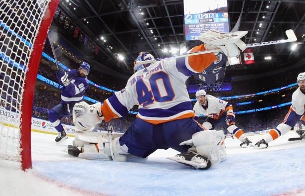 Semyon Varlamov of the New York Islanders makes the save on Nikita Kucherov of the Tampa Bay Lightning in Game Two of the Stanley Cup Semifinals...