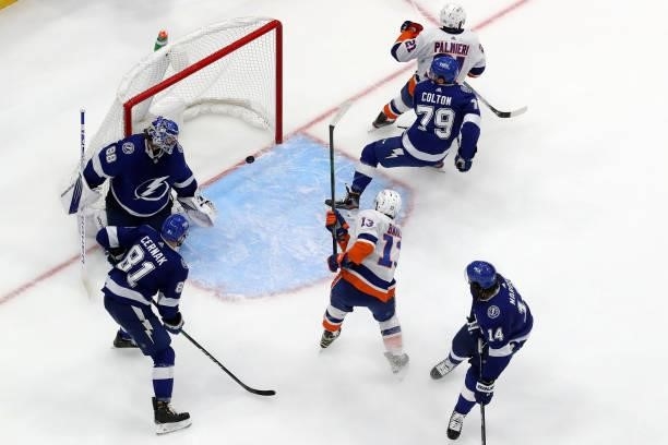Mathew Barzal of the New York Islanders scores a goal on Andrei Vasilevskiy of the Tampa Bay Lightning during the third period in Game Two of the...