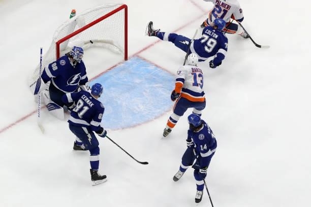 Mathew Barzal of the New York Islanders scores a goal on Andrei Vasilevskiy of the Tampa Bay Lightning during the third period in Game Two of the...