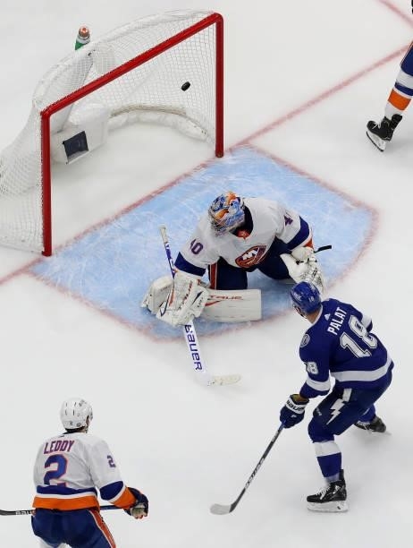 Ondrej Palat of the Tampa Bay Lightning scores a goal on Semyon Varlamov of the New York Islanders during the second period in Game Two of the...