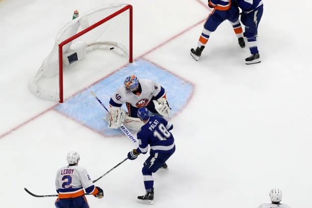 Ondrej Palat of the Tampa Bay Lightning scores a goal on Semyon Varlamov of the New York Islanders during the second period in Game Two of the...