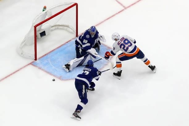 Andrei Vasilevskiy of the Tampa Bay Lightning makes a save against Brock Nelson of the New York Islanders in Game Two of the Stanley Cup Semifinals...
