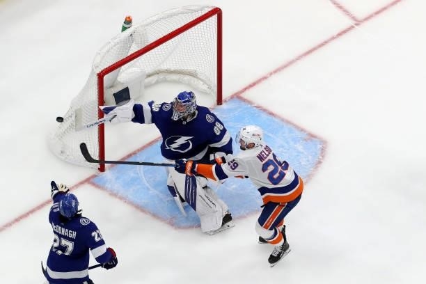 Andrei Vasilevskiy of the Tampa Bay Lightning makes a save against Brock Nelson of the New York Islanders in Game Two of the Stanley Cup Semifinals...
