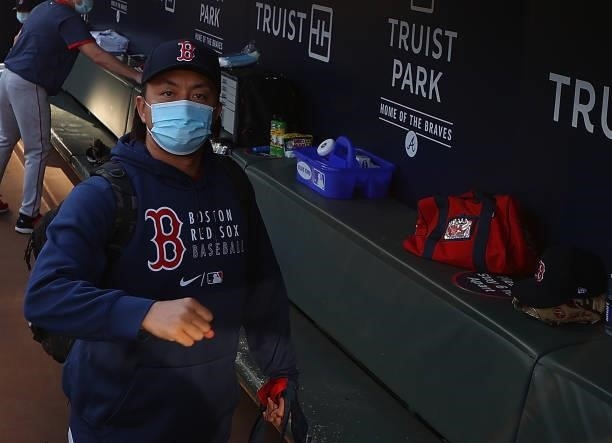 Hirokazu Sawamura of the Boston Red Sox walks into the dugout prior to the game against the Atlanta Braves at Truist Park on June 15, 2021 in...