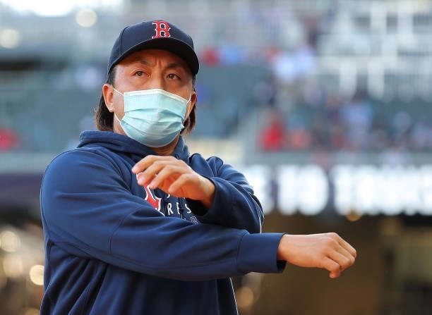 Hirokazu Sawamura of the Boston Red Sox walks in front of the dugout prior to the game against the Atlanta Braves at Truist Park on June 15, 2021 in...