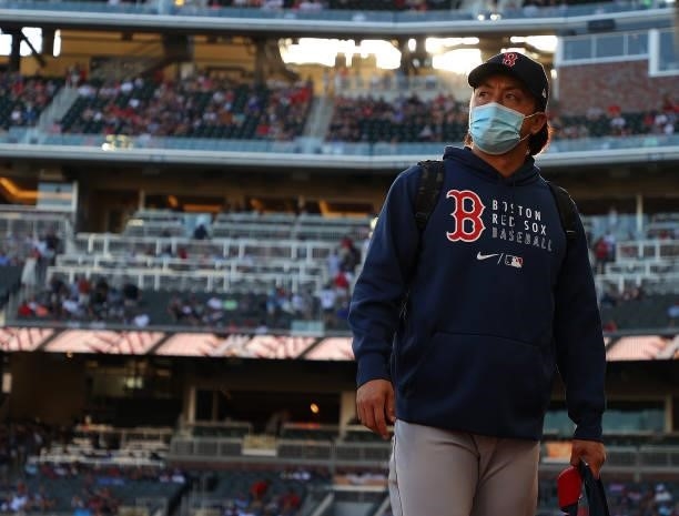 Hirokazu Sawamura of the Boston Red Sox stands in front of the dugout prior to the game against the Atlanta Braves at Truist Park on June 15, 2021 in...