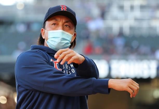 Hirokazu Sawamura of the Boston Red Sox walks in front of the dugout prior to the game against the Atlanta Braves at Truist Park on June 15, 2021 in...