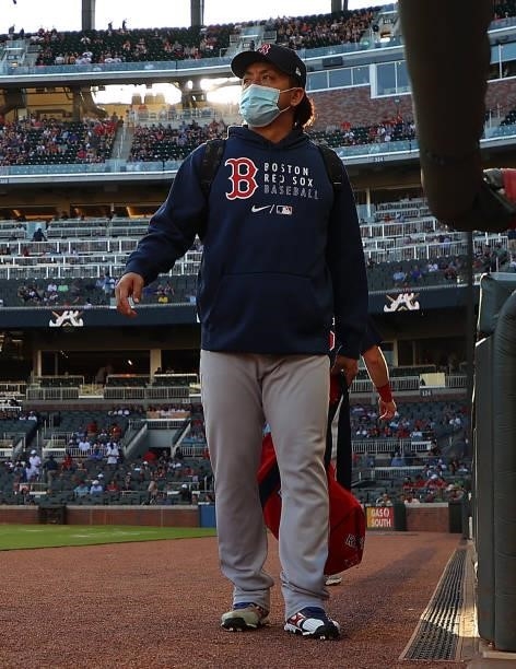Hirokazu Sawamura of the Boston Red Sox stands in front of the dugout prior to the game against the Atlanta Braves at Truist Park on June 15, 2021 in...