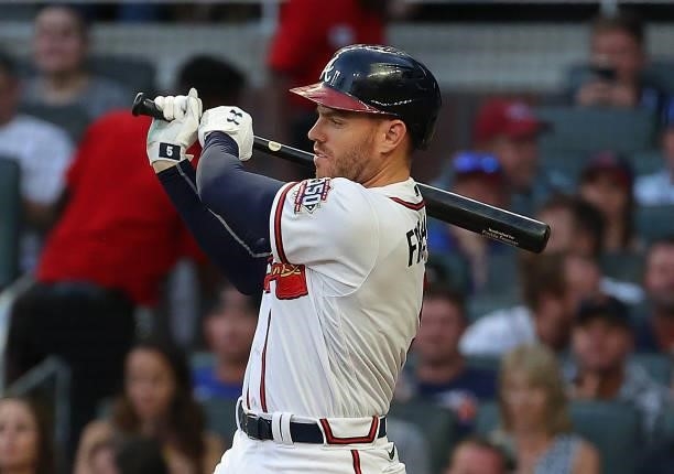 Freddie Freeman of the Atlanta Braves hits a RBI single in the third inning against the Boston Red Sox at Truist Park on June 15, 2021 in Atlanta,...