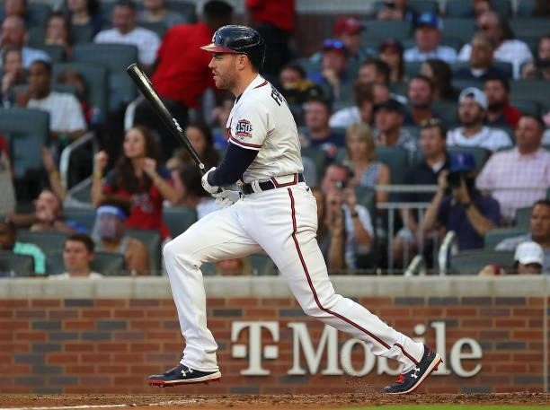 Freddie Freeman of the Atlanta Braves hits a RBI single in the third inning against the Boston Red Sox at Truist Park on June 15, 2021 in Atlanta,...