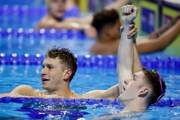 Ryan Murphy and Hunter Armstrong of the United States react after competing in the Men’s 100m backstroke final Day Three of the 2021 U.S. Olympic...