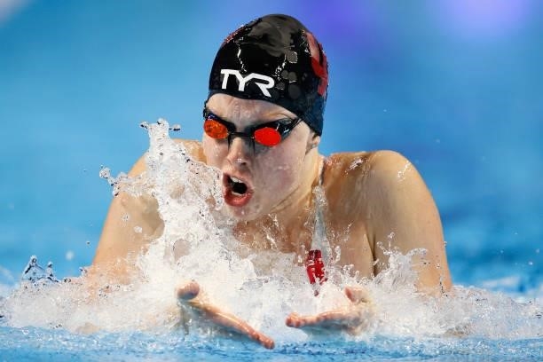 Lilly King of the United States competes in the Women’s 100m breaststroke final during Day Three of the 2021 U.S. Olympic Team Swimming Trials at CHI...