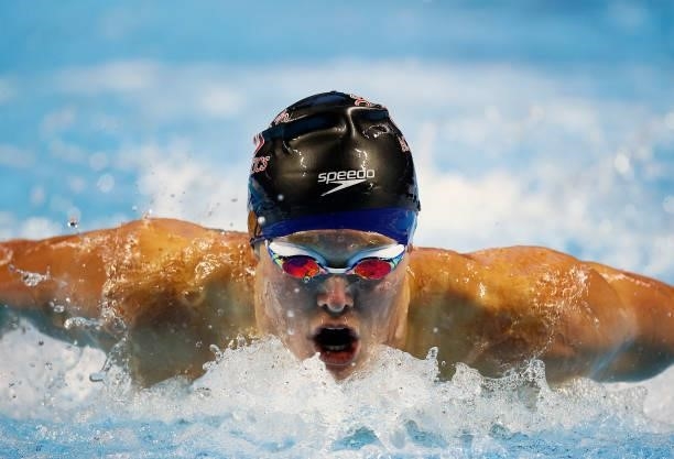 Trenton Julianof the United States competes in the men’s 200m butterfly final during Day Three of the 2021 U.S. Olympic Team Swimming Trials at CHI...