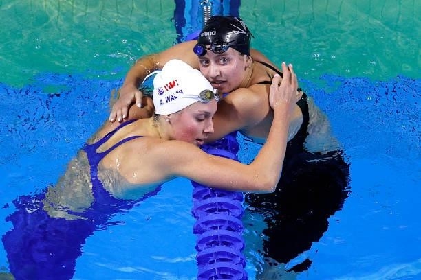 Alex Walsh and Kate Douglass of the United States react after competing in a semifinal heat for the Women's 200m Individual Medley during Day Three...