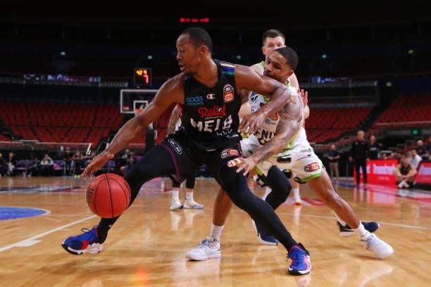 Scotty Hopson of United drives to the basket under pressure from Keifer Sykes of the Phoenix during game three of the NBL Semi-Final Series between...