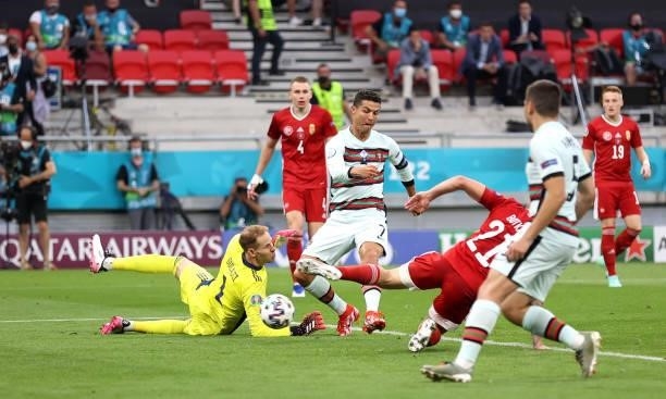 Cristiano Ronaldo of Portugal scores his sides third goal during the UEFA Euro 2020 Championship Group F match between Hungary and Portugal on June...