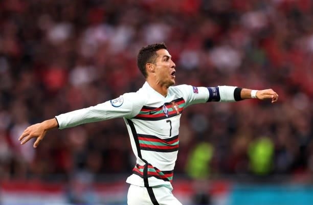 Cristiano Ronaldo of Portuagl celebrates scoring his sides third goal during the UEFA Euro 2020 Championship Group F match between Hungary and...