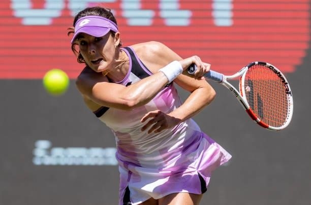 Alize Cornet of France plays a forehand against Bianca Andreescu of Canada in the women's singles second round match during day 5 of the bett1open at...