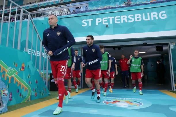 Artem Dzyuba and Magomed Ozdoev of Russia enter the pitch for the warm up prior to the UEFA Euro 2020 Championship Group B match between Finland and...