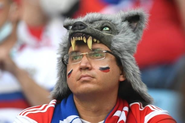 Russia fan wearing a wolf hat looks on prior to the UEFA Euro 2020 Championship Group B match between Finland and Russia at Saint Petersburg Stadium...
