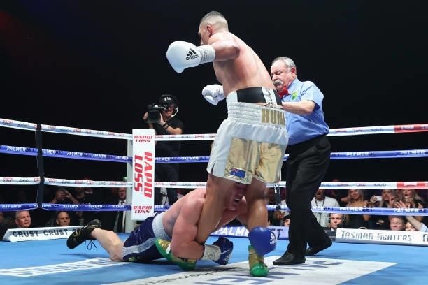 Paul Gallen tackles Justis Huni during their Australian heavyweight title fight at ICC Sydney on June 16, 2021 in Sydney, Australia.