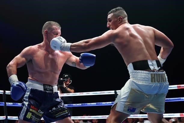 Justis Huni punches Paul Gallen during their Australian heavyweight title fightduring the Australian heavyweight title fight between Justis Huni and...