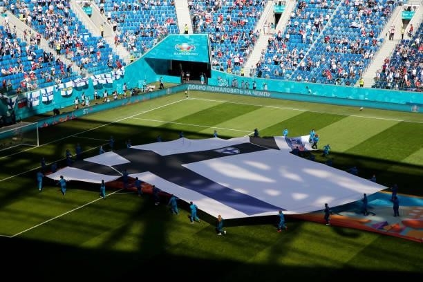 Large replica shirt of Finland is displayed on the pitch prior to the UEFA Euro 2020 Championship Group B match between Finland and Russia at Saint...