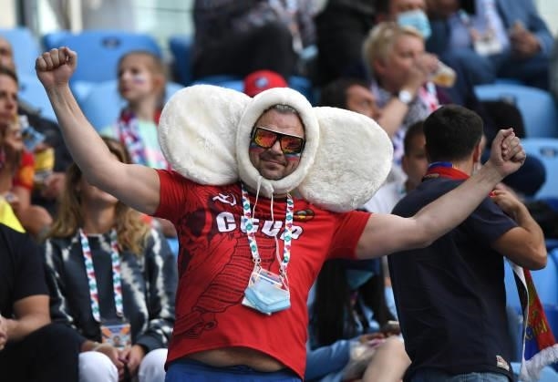 Russia fan wearing a hat reacts prior to the UEFA Euro 2020 Championship Group B match between Finland and Russia at Saint Petersburg Stadium on June...
