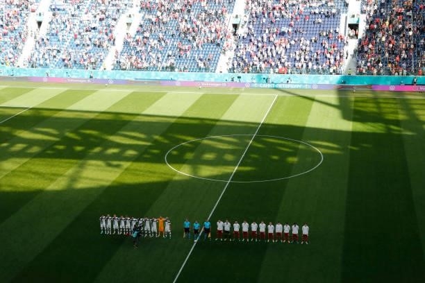 Both teams stand for the national anthems prior to the UEFA Euro 2020 Championship Group B match between Finland and Russia at Saint Petersburg...