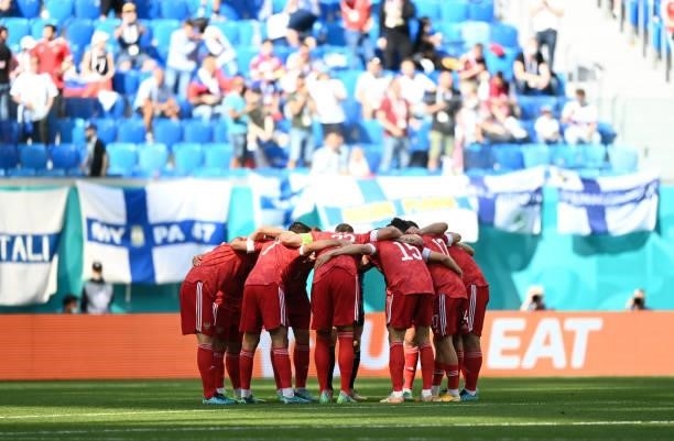 Players of Russia form a huddle prior to the UEFA Euro 2020 Championship Group B match between Finland and Russia at Saint Petersburg Stadium on June...
