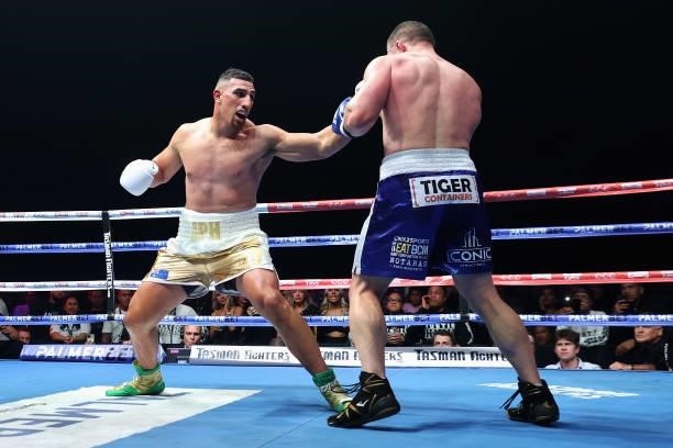Justis Huni punches Paul Gallen during their Australian heavyweight title fightduring the Australian heavyweight title fight between Justis Huni and...