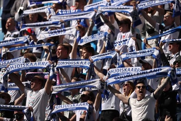Finland fans raise scarves as they show their support prior to the UEFA Euro 2020 Championship Group B match between Finland and Russia at Saint...