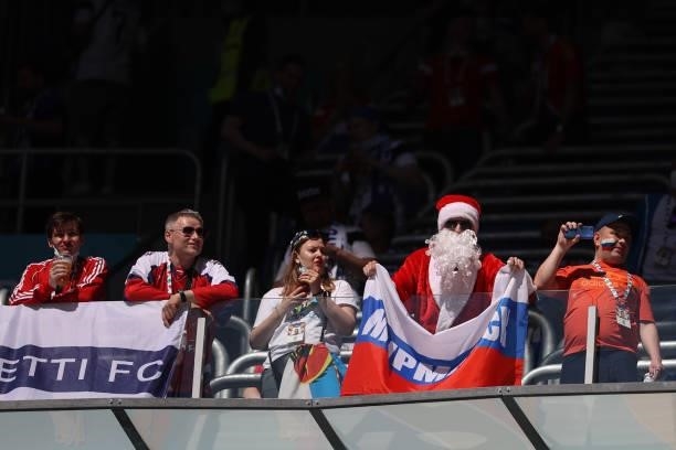 Russia fan dressed as Santa Claus shows their support during the UEFA Euro 2020 Championship Group B match between Finland and Russia at Saint...