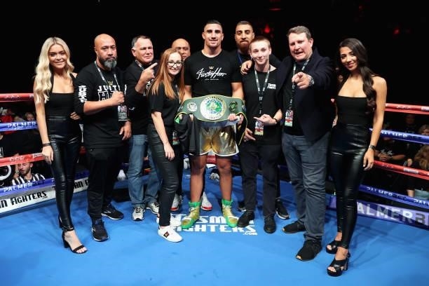 Justis Huni poses with his team after winning the Australian heavyweight title fight against Paul Gallen at ICC Sydney on June 16, 2021 in Sydney,...