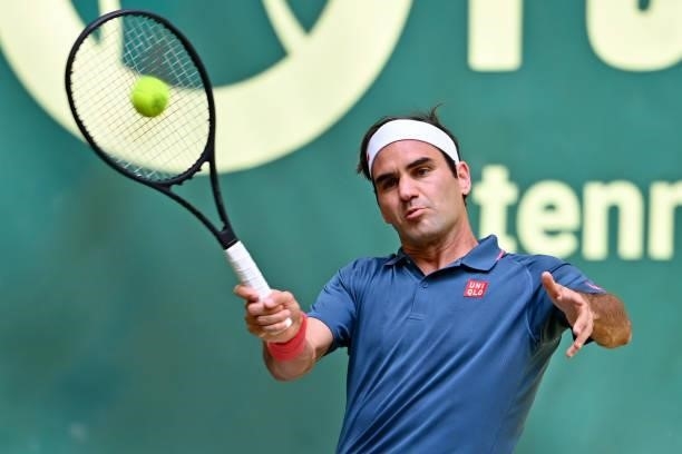 Roger Federer of Switzerland plays a forehand in his match against Felix Auger-Aliassime of Canada during day 5 of the Noventi Open at OWL-Arena on...